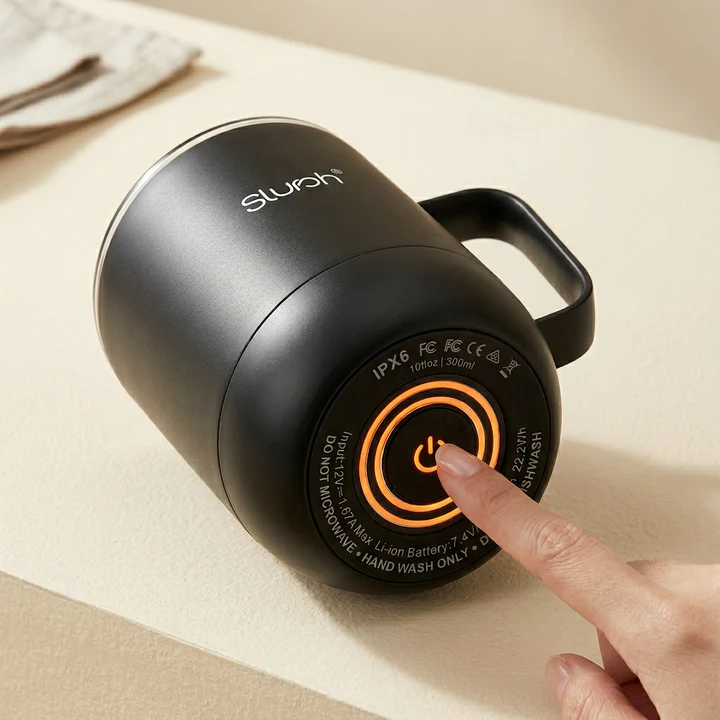 Underside of the Slursh Smart Mug showing its single control button