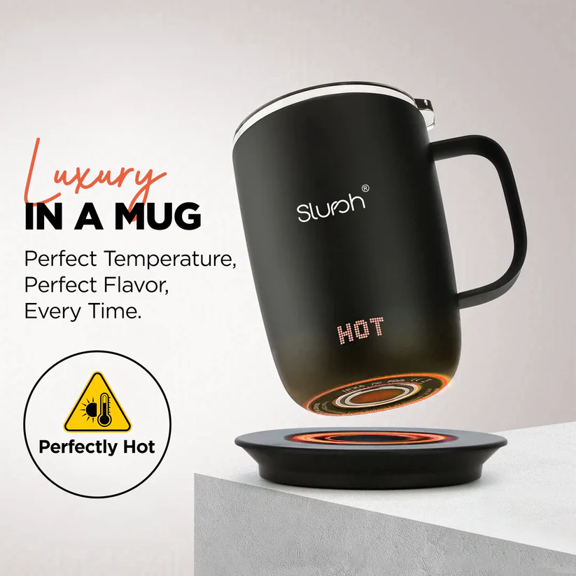 Slursh Smart Mug beside a notebook