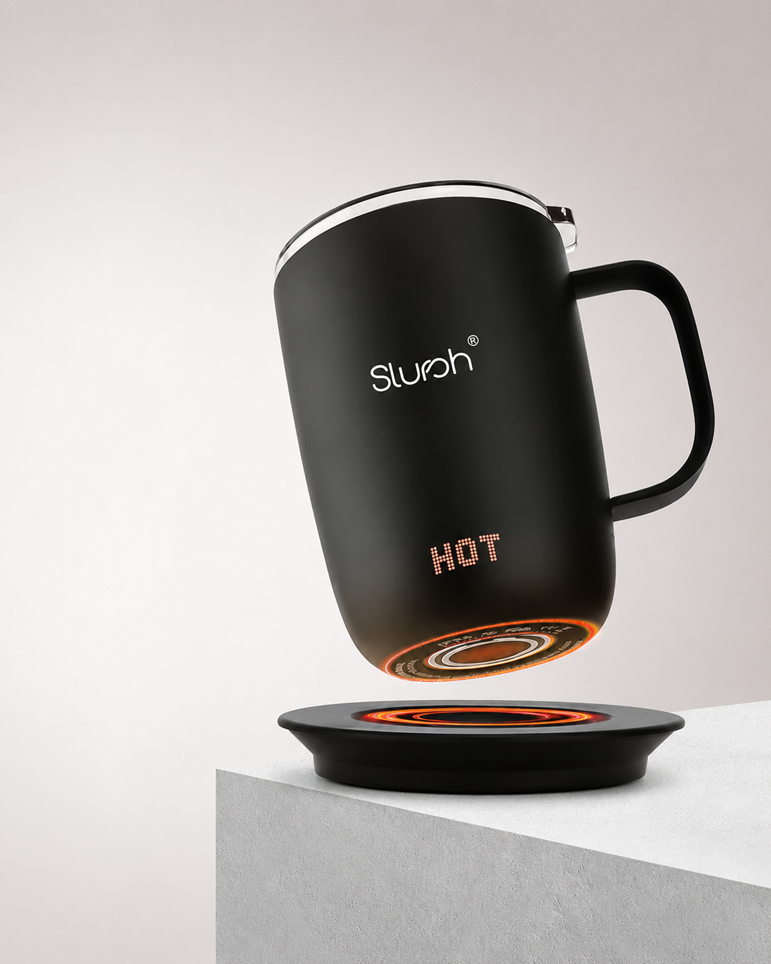 Slursh Smart Mug on a marble surface with soft warm light