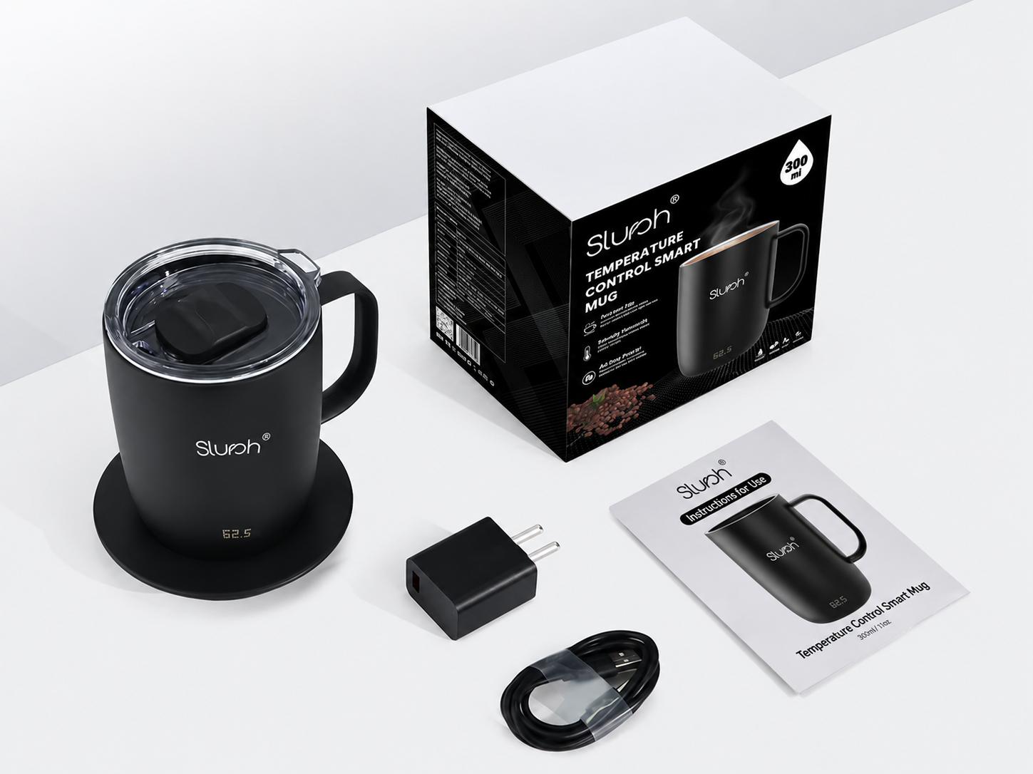Slursh Smart Mug shown with its packaging, charger, cable and instructions